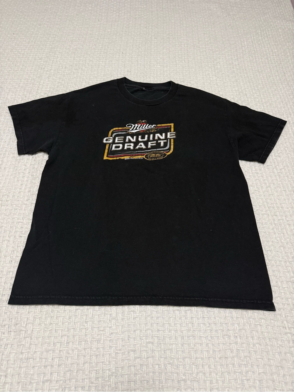 Miller beer men’s black tee, fits like a large.